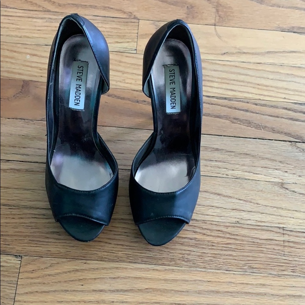 Black Steve Madden peep toe heels.
